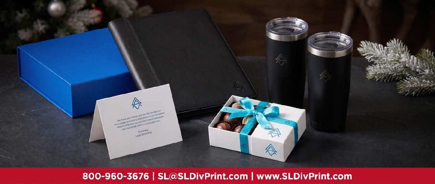 Client Holiday Gifts Premium Logo Merchandise Kit | SL Diversified Printing Client gift set on dark slate with a black leather portfolio two engraved black tumblers chocolates and a signed card corporate holiday gifts employee appreciation client retention repeat business branded swag custom apparel promotional products rush printing order fulfillment logo merchandise remote teams