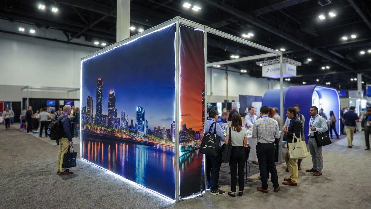 Immersive Tension Fabric Trade Show Booth 2026 | SL Diversified Printing tension fabric trade show displays immersive 10x10 trade show displays 2026 10 hopup banner diversified printing services 10x10 trade show displays step and repeat banner step and repeat banner trade show display banners retractable banner