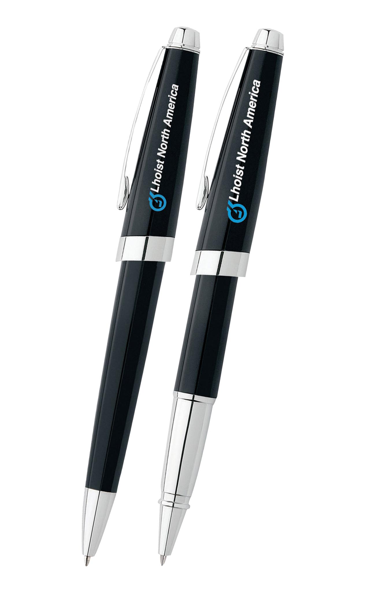 Two black executive pens with silver caps and clips displaying Lhoist North America and a blue logo side by side
